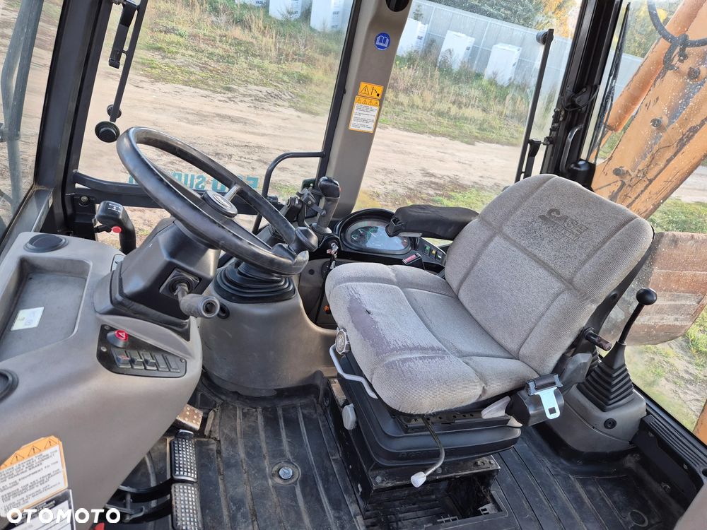 Case 580 sr Rok 2005 - 6