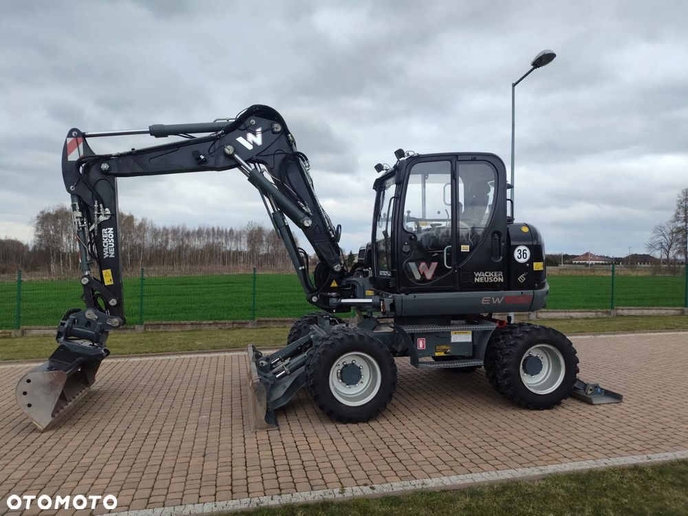 Wacker Neuson EW100 / BLACK EDITION - wersja limitowana / KOPARKA KOŁOWA / ROTOTILT / PŁUG + PODPORY / - 1