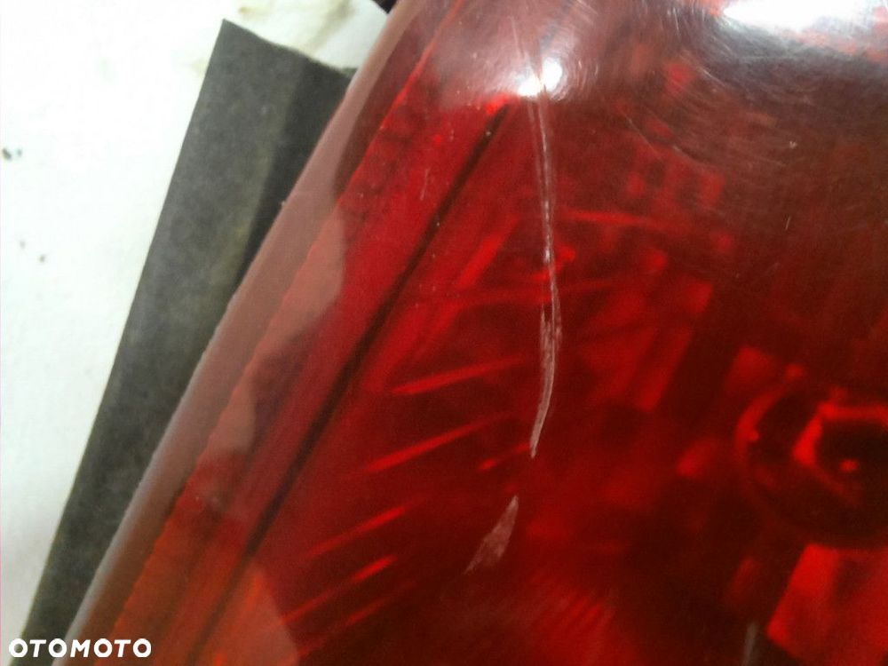 OPEL ASTRA-G 2.0 DTL 98-09 LAMPA TYŁ TYLNA LEWA ZEWNĘTRZNA - 2