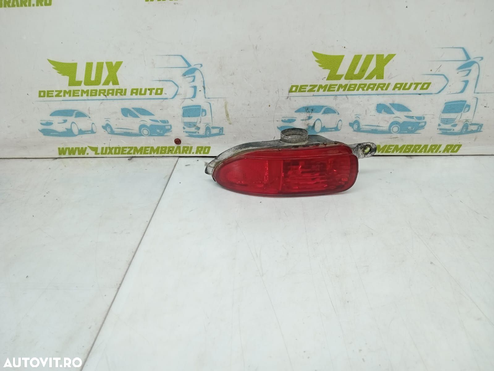 Reflector dreapta spate 24409356 Opel Corsa C [2000 - 2003] - 1