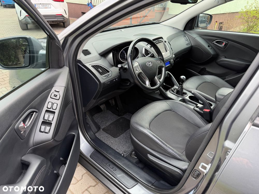 Hyundai ix35 blue 1.6 2WD Finale Gold - 13