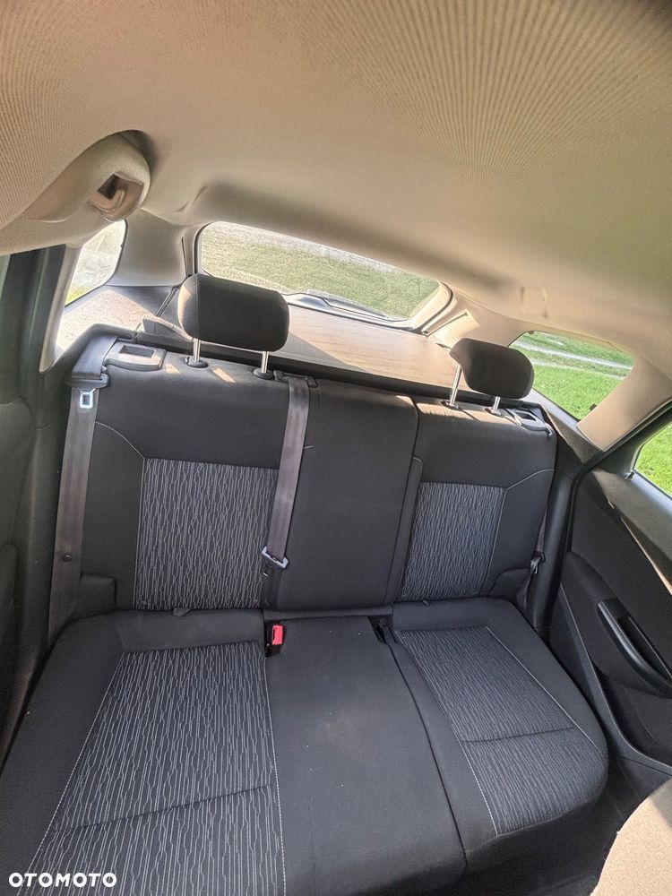 Opel Astra IV 1.4 T Sport - 12