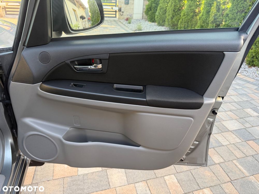 Suzuki SX4 1.6 Comfort Plus - 27