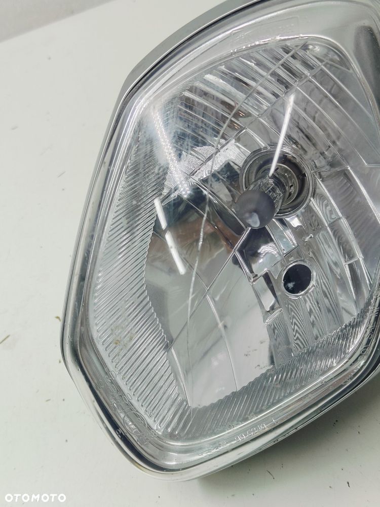 Reflektor Lewy Pęknięty Triumph Speed Triple 1050 - 2