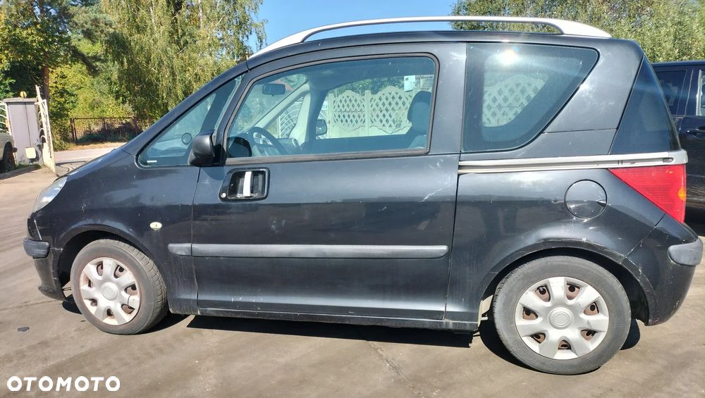 PEUGEOT 1007 1,4 75KM DRZWI LEWE PRZEDNIE PRZÓD MECHANIZM EXLD