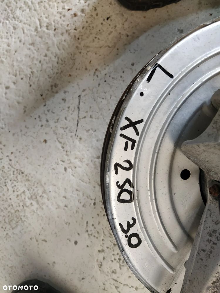 JAGUAR XF X250 3.0 ZWROTNICA PÓŁOŚ TARCZA PIASTA ŁOŻYSKO ZACISK TYŁ TYLNY LEWY - 13