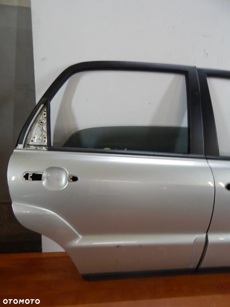 Drzwi prawy tył Kia Sportage II 04-10 srebrne 9S Łuków części
