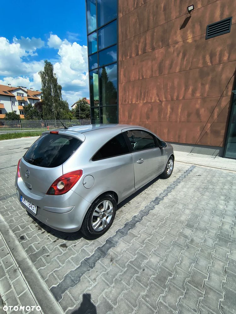 Opel Corsa 1.4 16V Cosmo - 7
