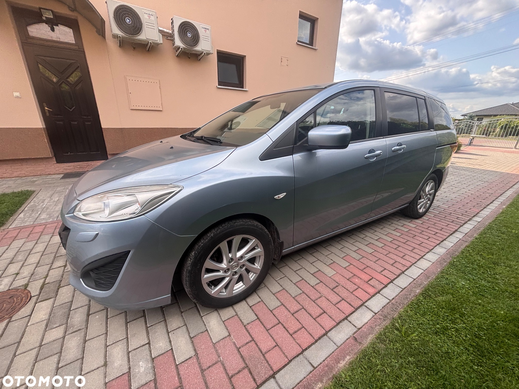 Mazda 5 2.0 Exclusive + - 8