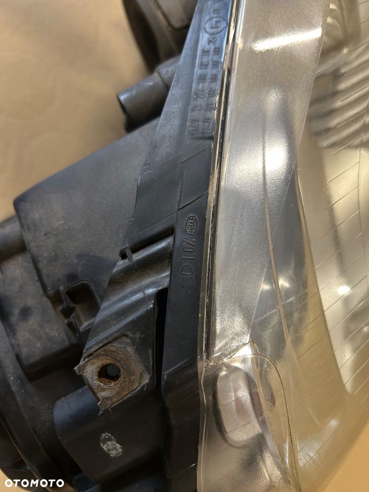 Lampa przednia prawa VW Golf V Jetta Hella Europejska - 5