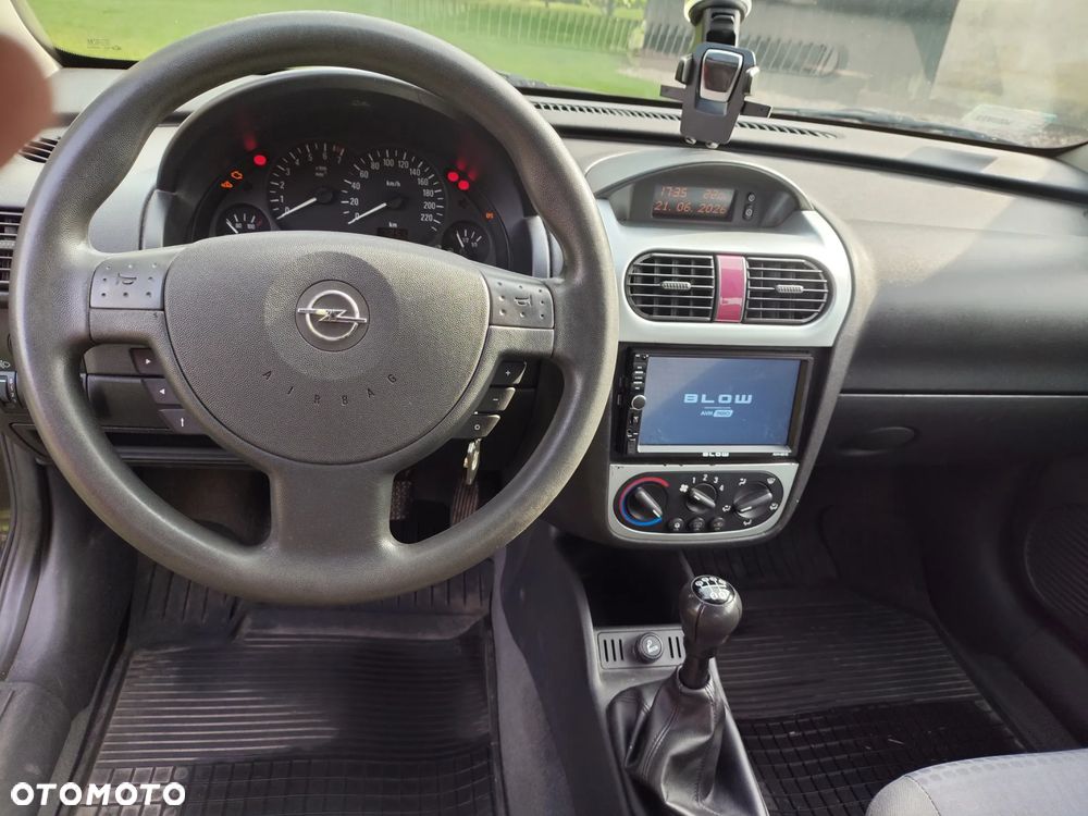 Opel Corsa 1.2 16V Cosmo - 11