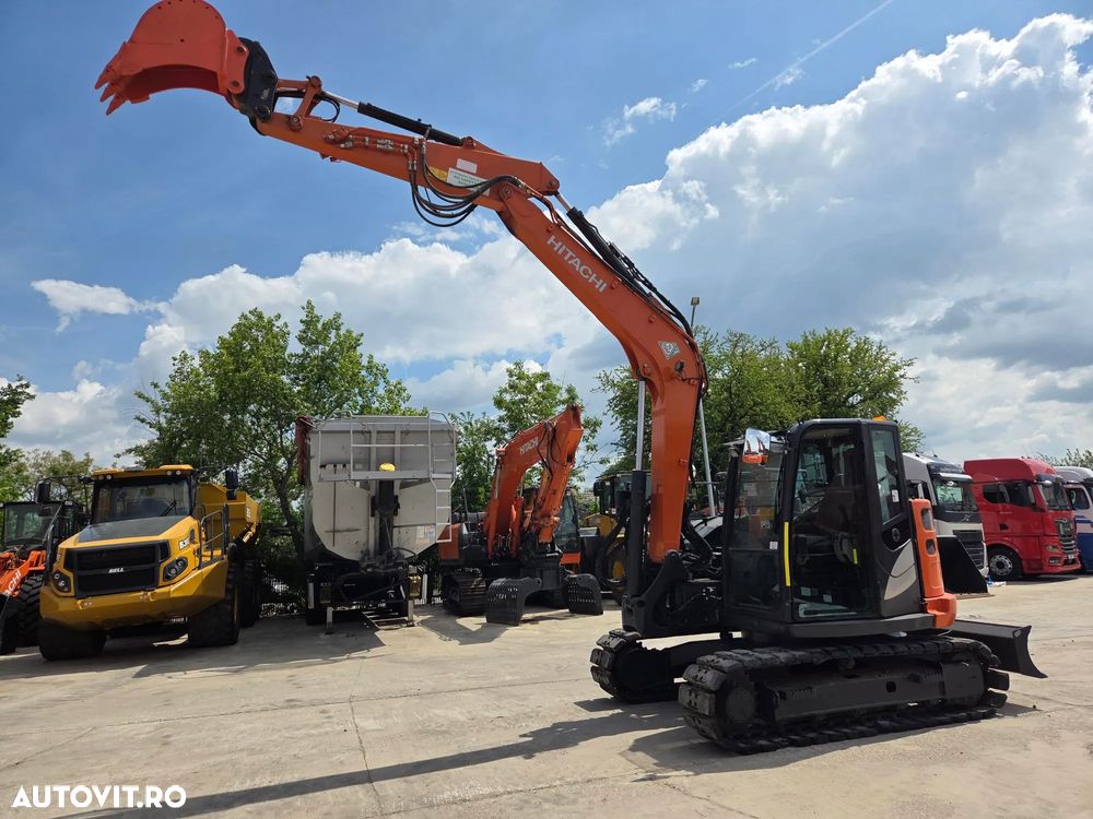Hitachi ZX85-6, 2022, 2.491h, Masa operationala 8,6t, cupla rapida HIDRAULICA+3 CUPE NOI, senile paduri cauciuc, inst picon si inst rotire pe brate, ad sapare 5m, ridica 3,8t, aer cond, LAMA, STARE FOARTE BUNA, posibil leasing 4 ani-PROMOTIE 62.900 EUR+Tva - 36