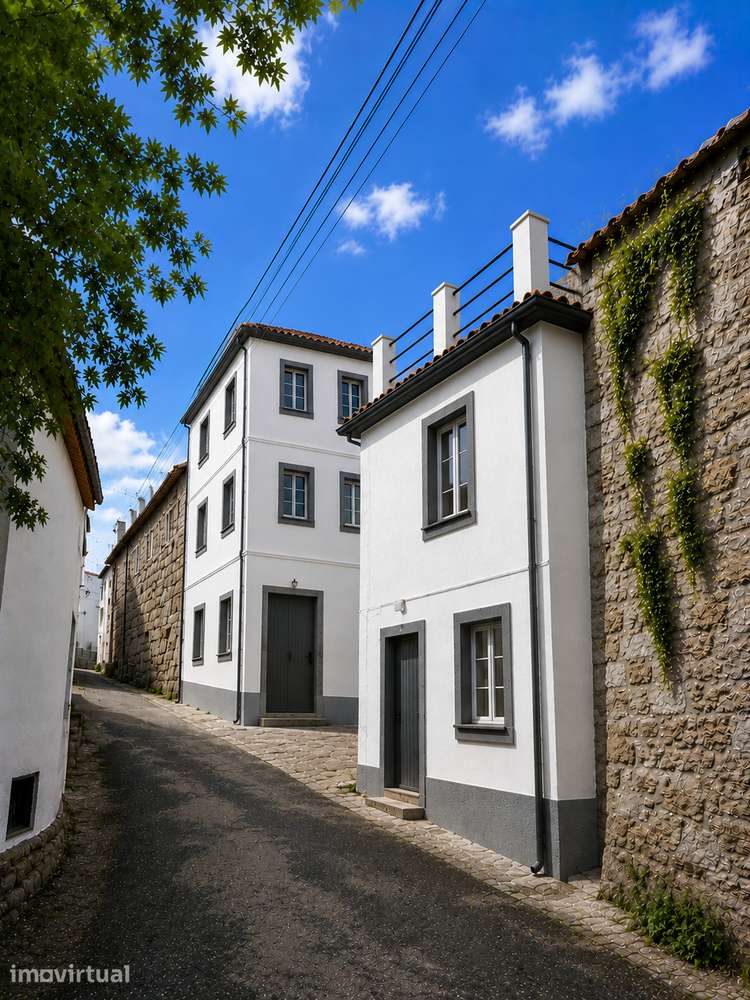 Edifício com 4 apartamentos, 3 T1 e um T3 duplex - Grande imagem: 2/15