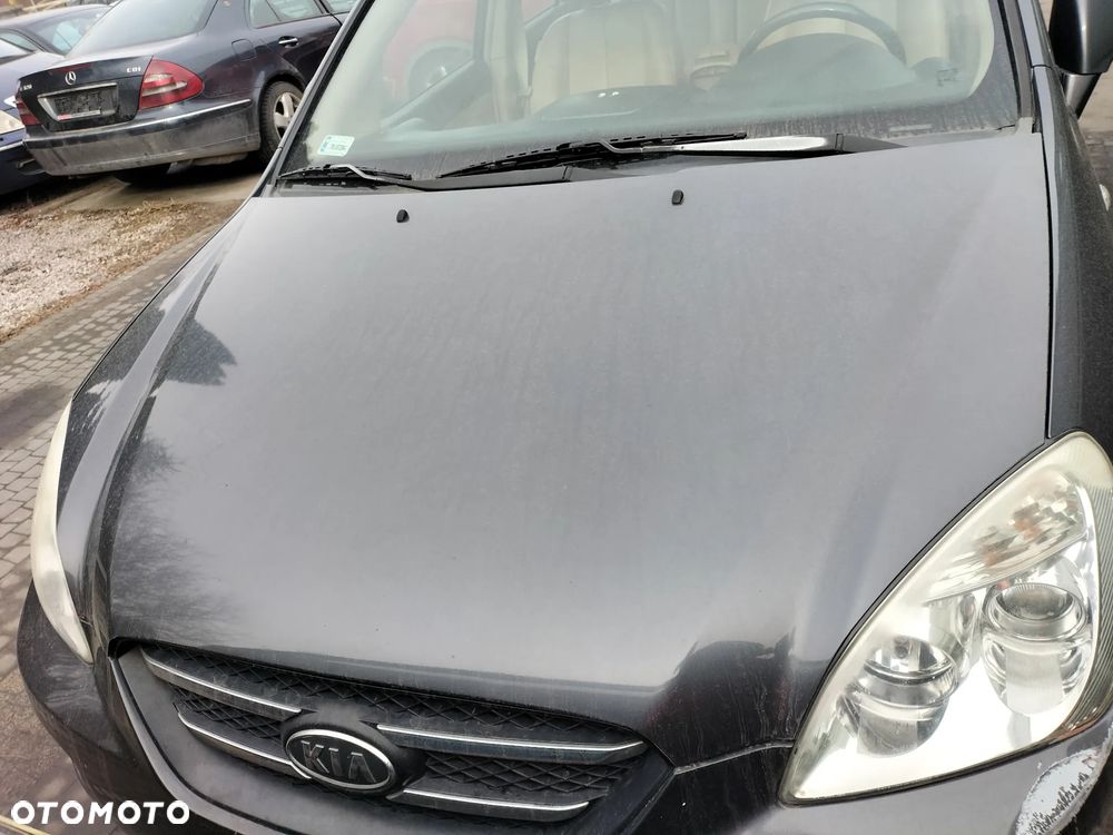 KOMPLET FOTELI  SKÓRZANYCH PRZÓD TYŁ 3 RZĄD KIA CARENS III 06-12r KOD LAK. 1U - 14