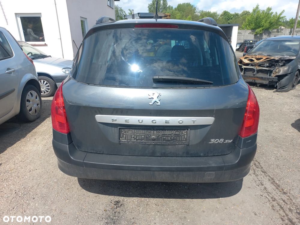 Peugeot 308 sw 1.4 16V 08r KTPD lampa tylna prawa lewa europa szt - 1