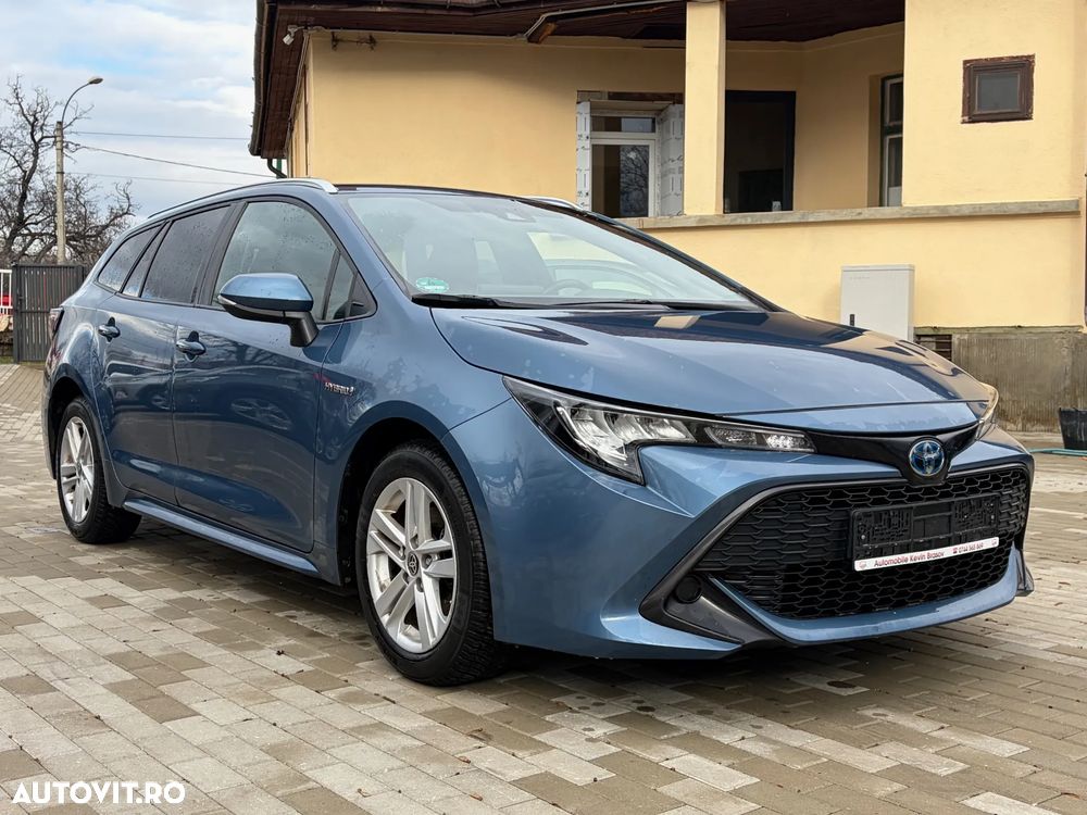 Toyota Corolla 1.8 HSD Business - 31