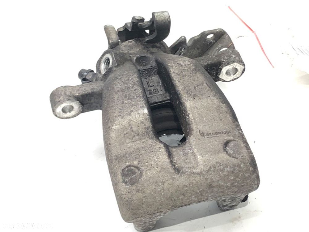 ZACISK LEWY TYŁ  OPEL ASTRA H Kombi (A04) 2004 - 2014 1.6 (L35) 77 kW [105 KM] benzyna 2004 - 2010 - 4