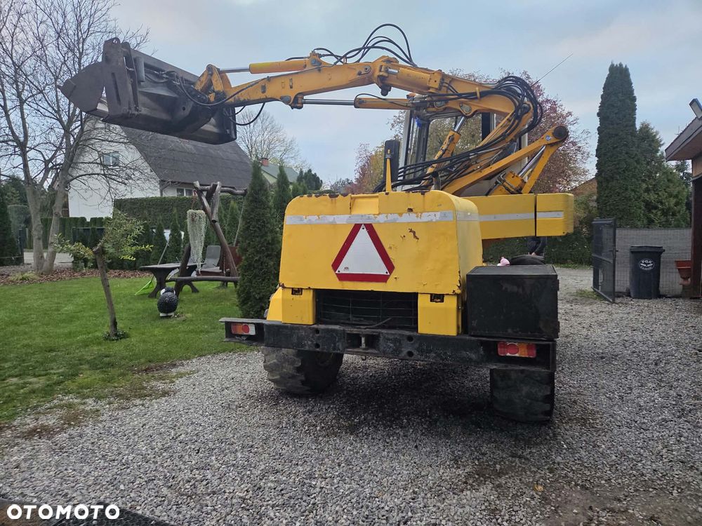 Mecalac 11CX i - 14