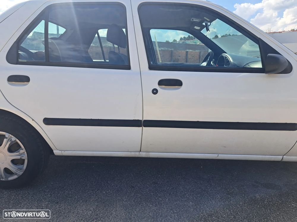 Mazda 121 1.25 - 16