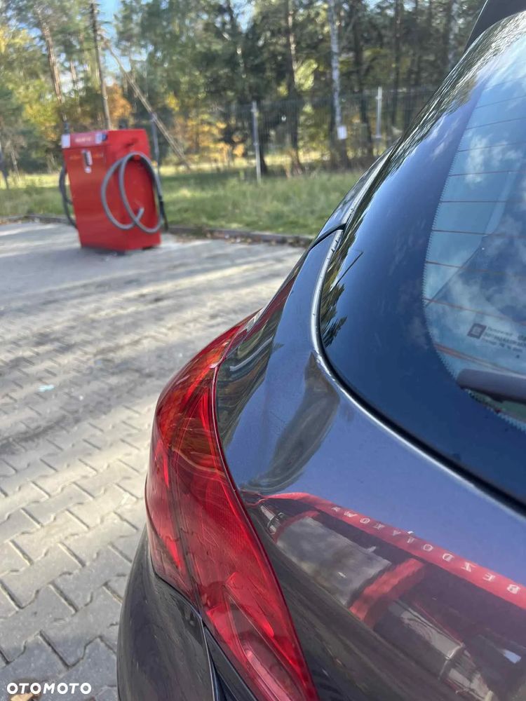 Opel Astra IV 1.4 Essentia - 12