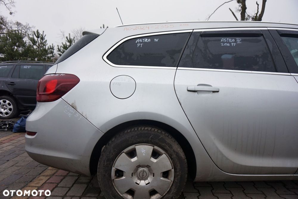 ĆWIARTKA BŁOTNIK TYLNY PRAWY ASTRA IV J KOMBI Z176 93867038 OPEL 2009-2015 - 1
