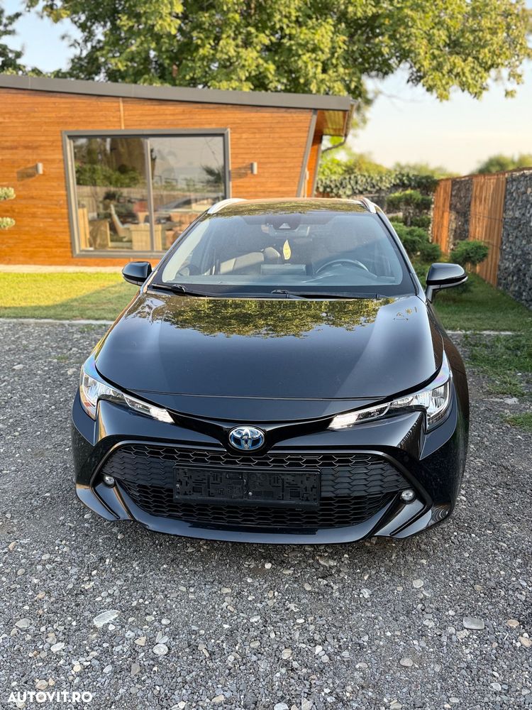 Toyota Corolla 1.8 HSD Business - 2