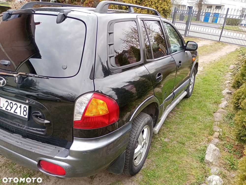 Hyundai Grand Santa Fe - 4