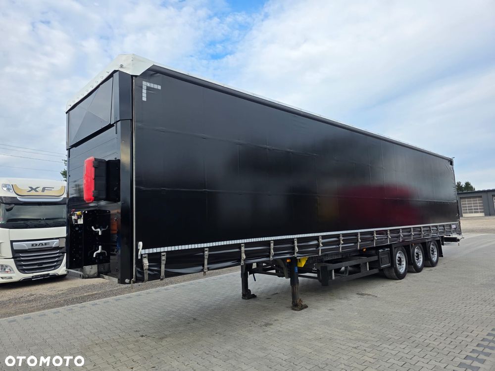 Schmitz Cargobull / FIRANKA / VARIOS / OS PODNOSZONA / CZTERY POZIOMY JAZDY / MULTI LOCK / XL - 1