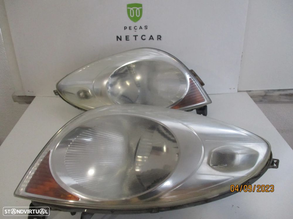 farol optica nissan note 2007 - 1