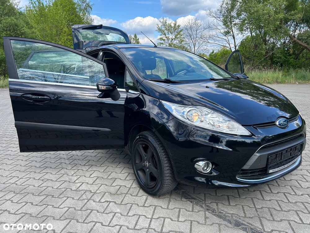 Ford Fiesta 1.4 Ghia - 24