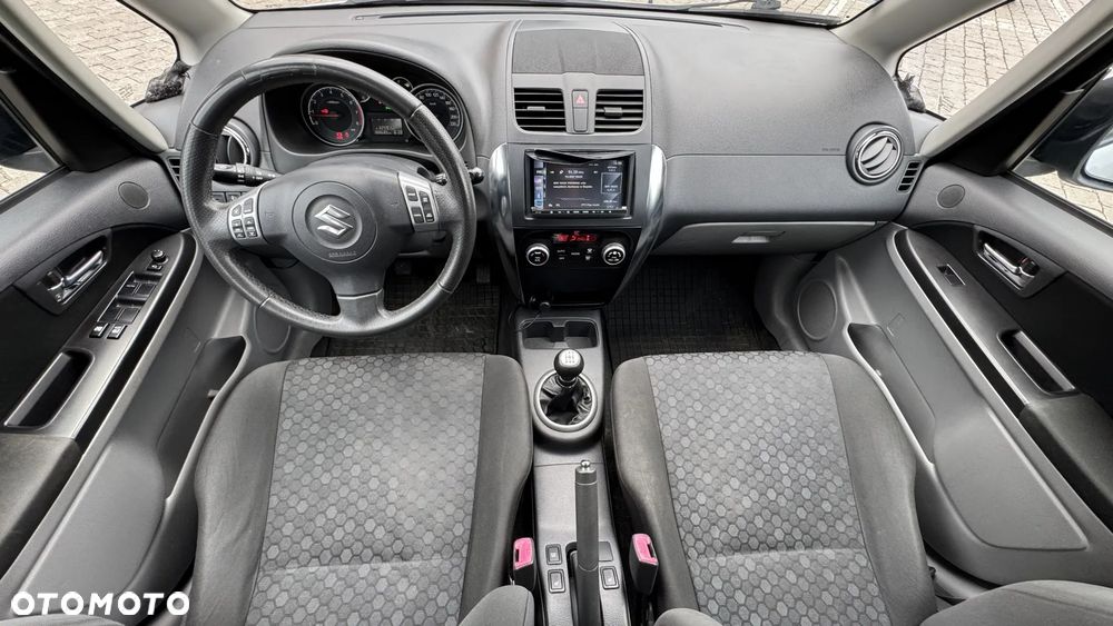 Suzuki SX4 1.6 Comfort Plus - 11