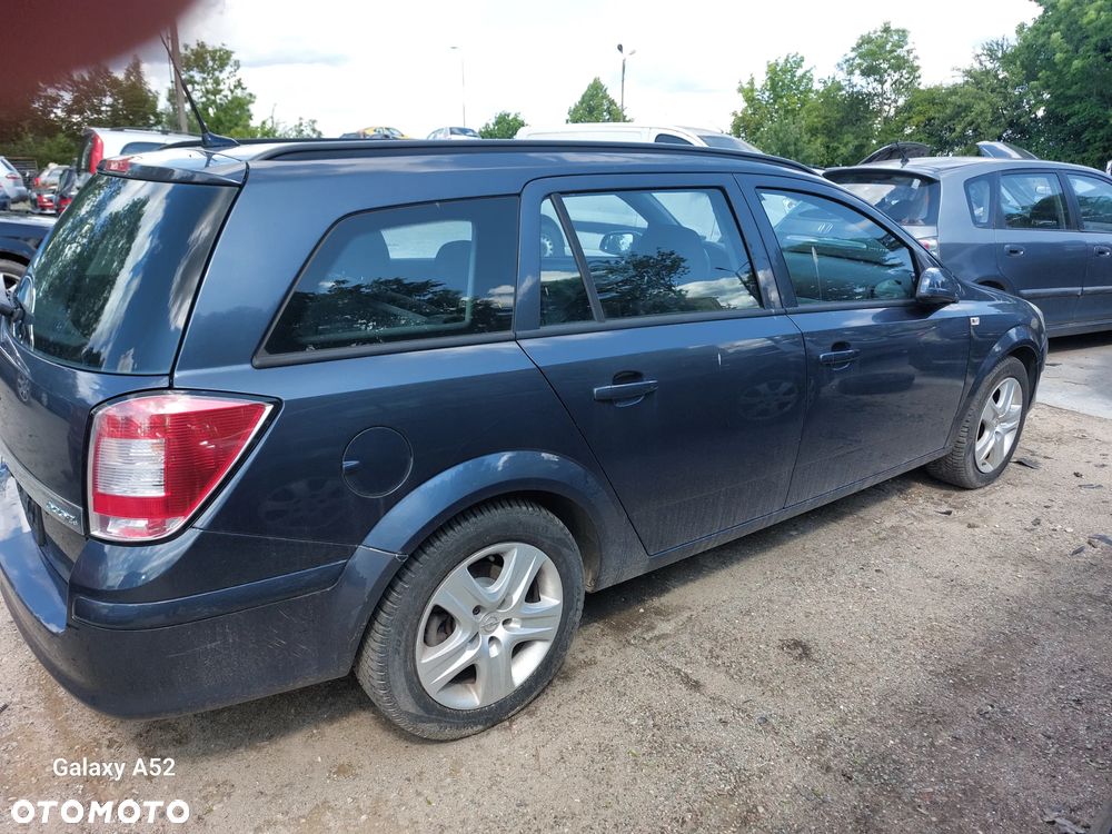 Zderzak OPEL ASTRA H KOMBI LIFT 1,7D 09R. maska,drzwi,klapa,lampy.... - 4