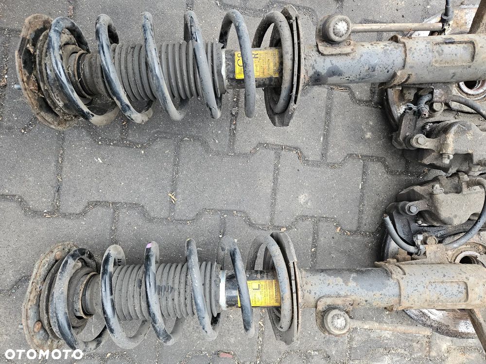 Opel Antara I Captiva mcpherson przód przedni lewy amortyzator - 2