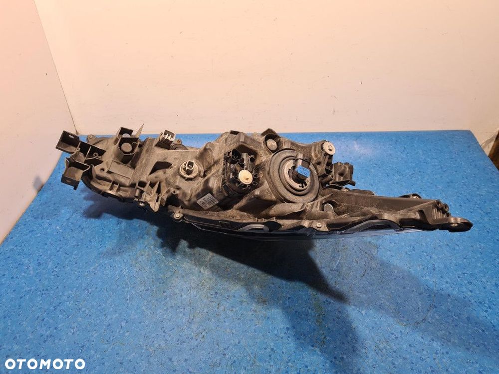 TOYOTA COROLLA E21 REFLEKTOR LEWY 81150-02T30-00 - 13