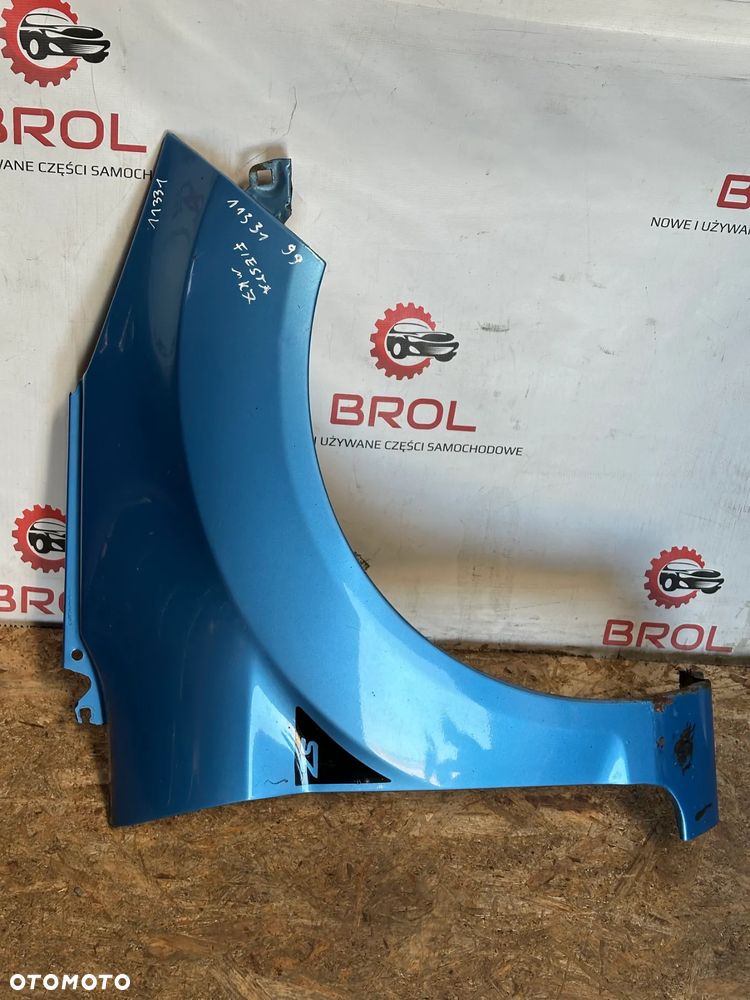 BŁOTNIK PRZEDNI PRAWY FORD FIESTA MK7  99