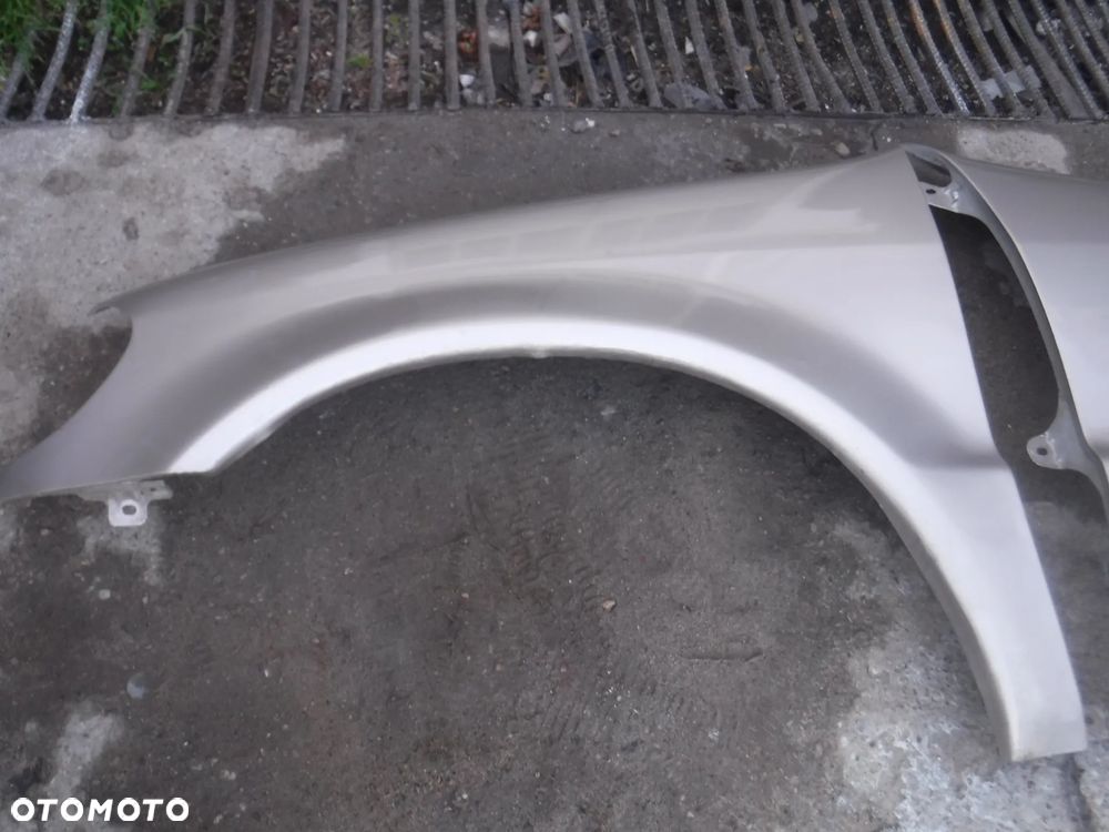 Mercedes ML FL Lift blotnik lewy  bez rdzy 693 C693 - 4