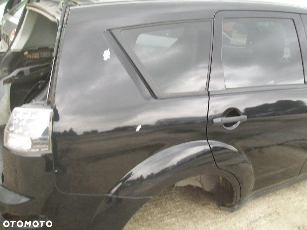 BŁOTNIK PRAWY TYŁ OUDLANDER - 1