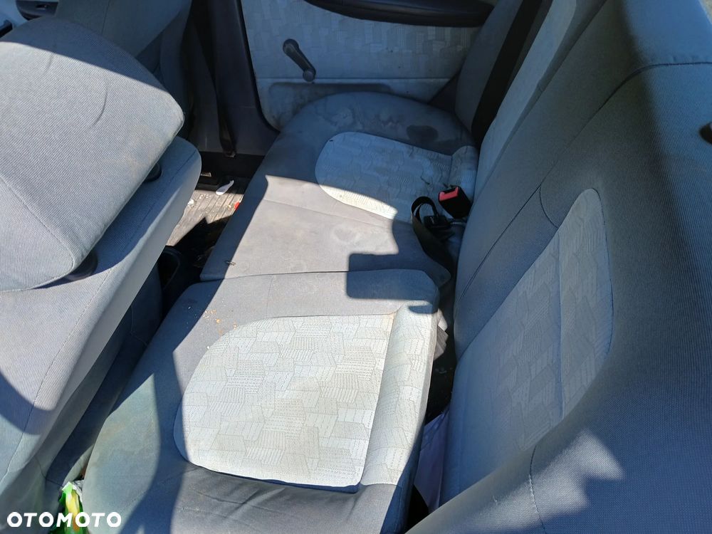 skoda fabia I 9771 fotel fotele kanapa deska kokpit podsufitka boczek boczki klamka podłokietnik - 4