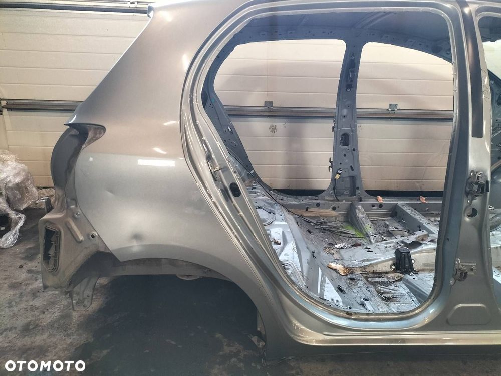 ĆWIARTKA BŁOTNIK PRAWY TYŁ TOYOTA YARIS II LIFT 1F8 - 2