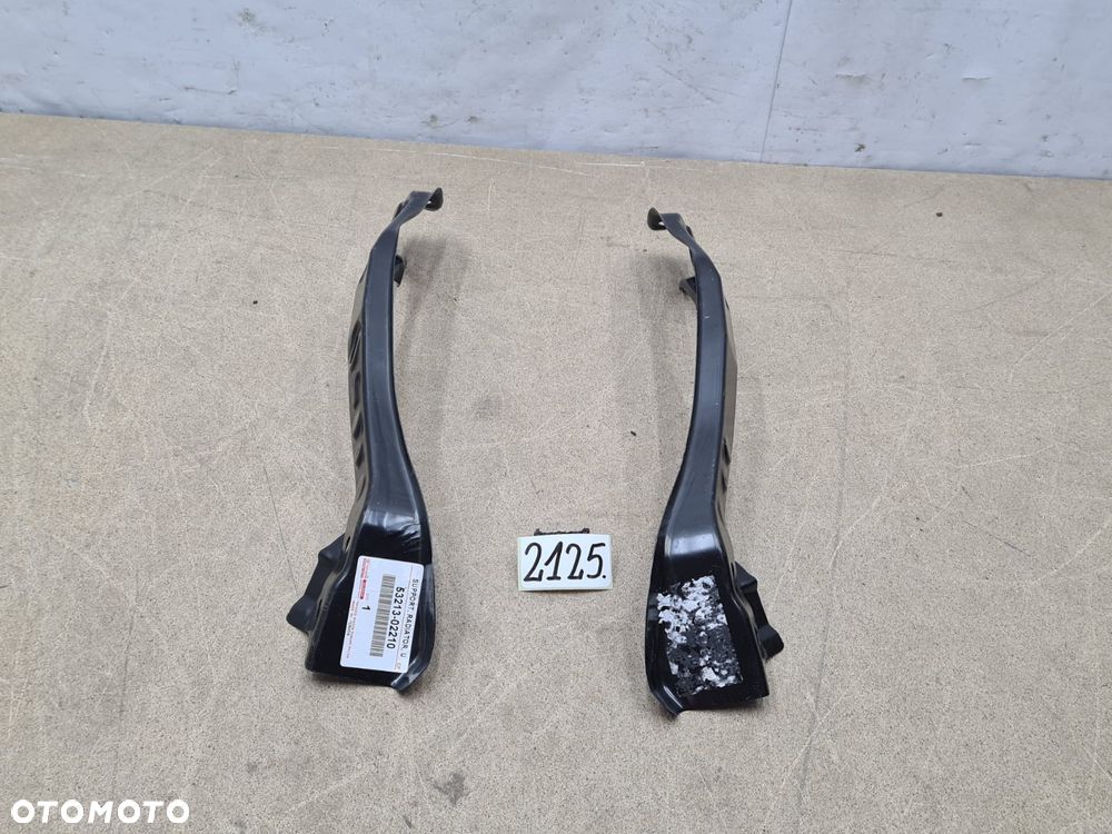 Toyota Corolla E21 53213-02210 wspornik lampy przód przedni komplet R+L - 7