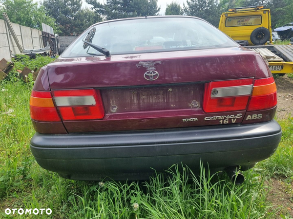 TOYOTA CARINA E 92-98 1996 r. LIFTBACK ZDERZAK TYŁ TYLNY EU