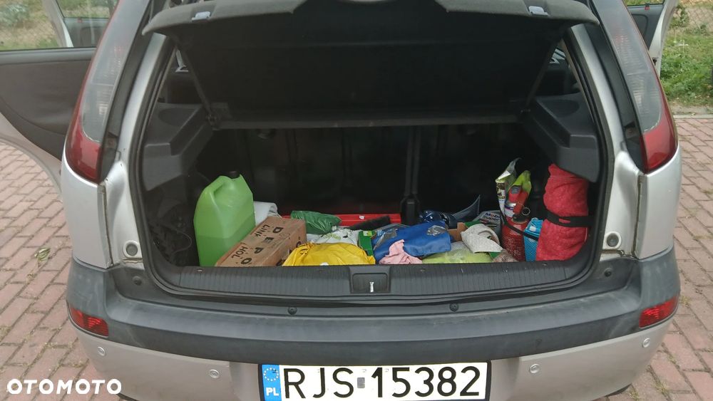 Opel Corsa 1.2 16V NJoy - 11