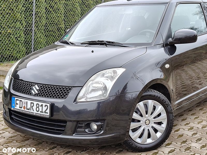 Suzuki Swift 1.3 Comfort - 31