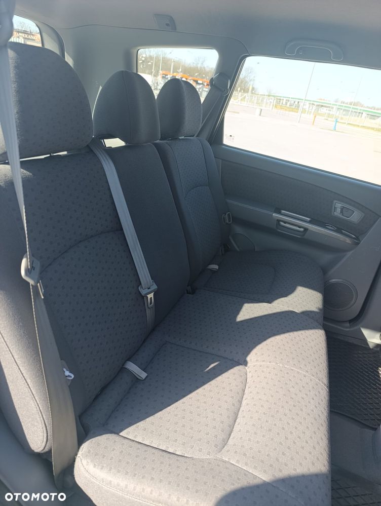 Kia Carens - 8