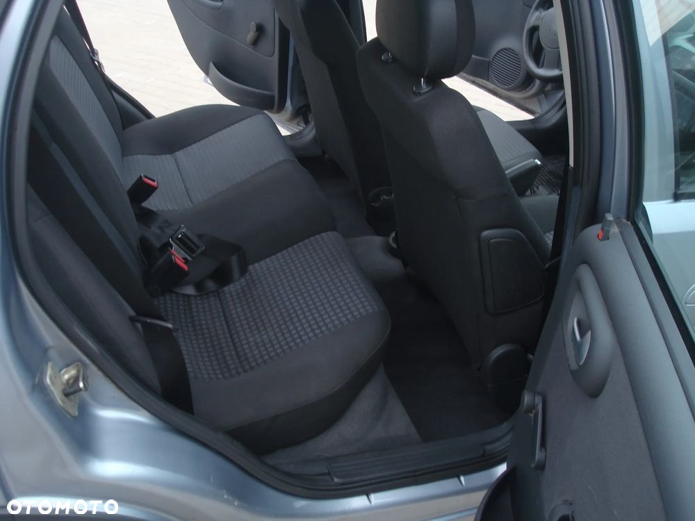 Opel Corsa 1.4 16V Cosmo - 30