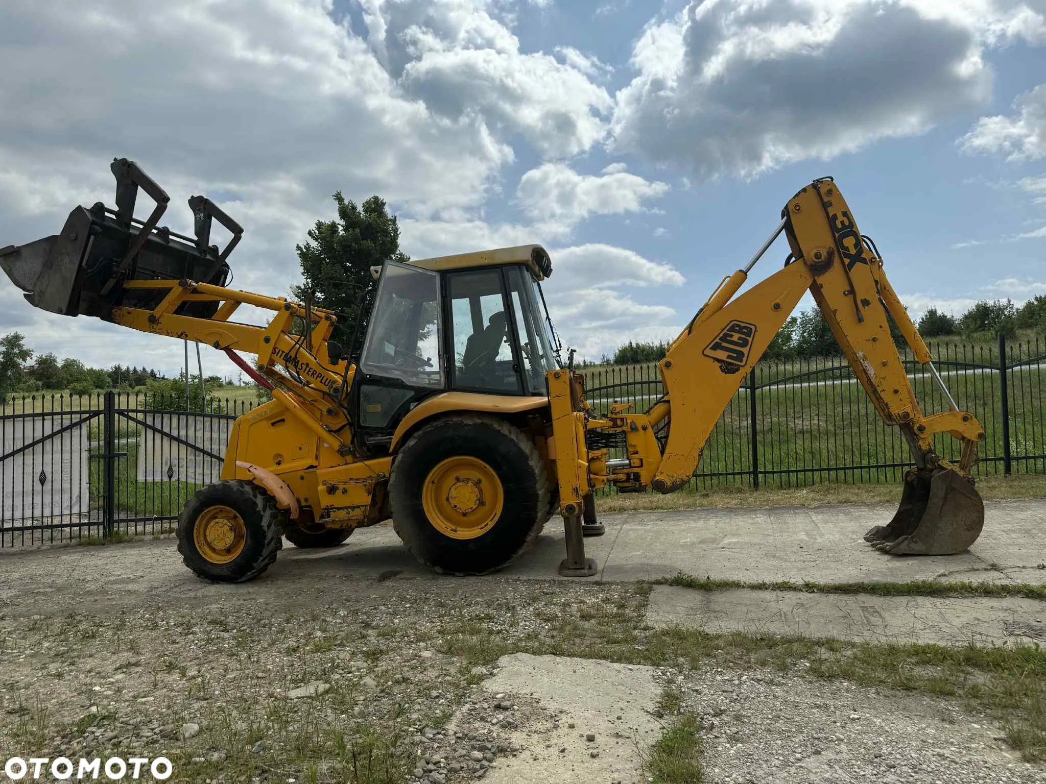 JCB koparko-ładowarka KOMATSU WB97 jcb 3cx - 18