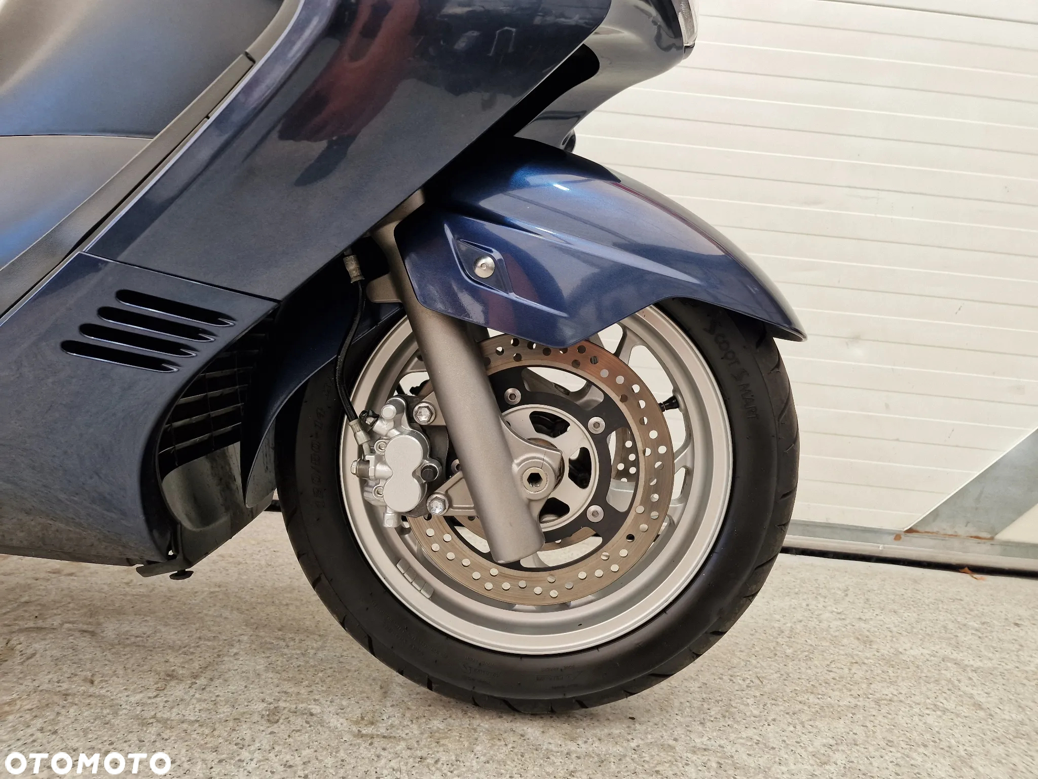 Suzuki Burgman - 21