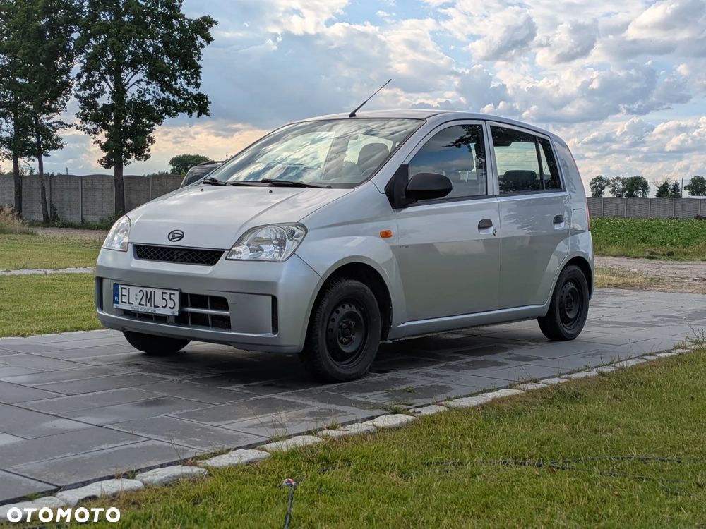 Daihatsu Cuore 1.0 Top - 1