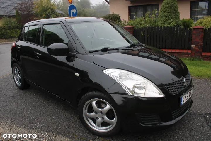 Suzuki Swift 1.3 Club - 4