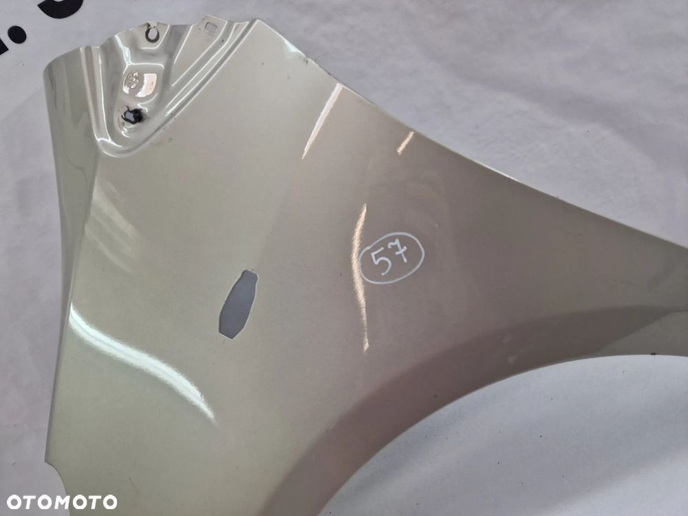 TOYOTA YARIS II LIFT 09-11 LEWY ŁADNY BŁOTNIK PRZEDNI PRZÓD , BEŻOWY METALIK , NR AUKCJI BŁ57 - 6